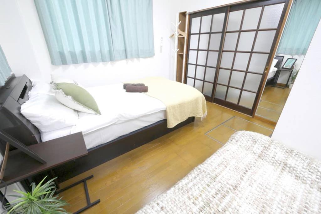 マスク配布ありa5 新宿10分 10人宿泊可能 出張在宅勤務に最適!!宿泊型テレワークスペース!!Wifi完備 回線安定してます!!長期宿泊受付中 Präfektur Tokio Exterior foto
